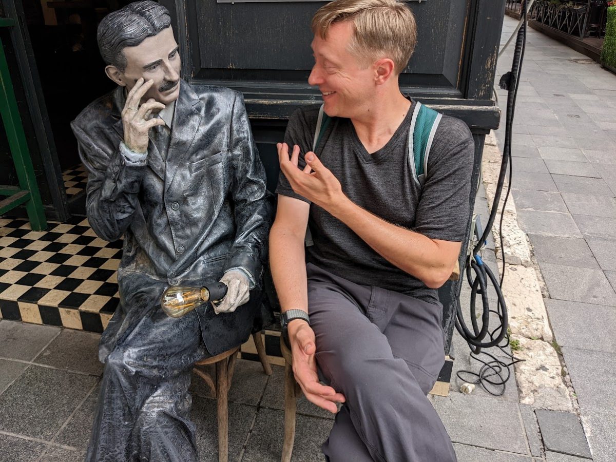 Me and Nikolai Tesla on a bench in Sarajevo